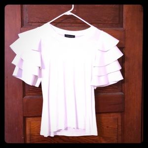 White shirt with ruffled sleeves